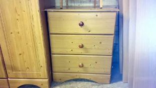 A pine effect 3 drawer chest