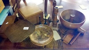 A quantity of wooden items including candlesticks etc.