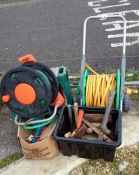 A hose, box of tools & a Black & Decker hedge trimmer