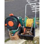 A hose, box of tools & a Black & Decker hedge trimmer