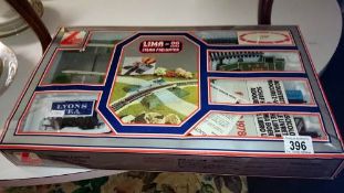 A boxed Lima 00 scale steam freighter