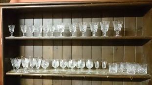 A quantity of cut glass glasses