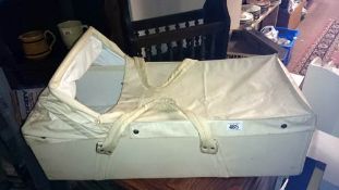 A vintage carry cot