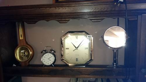 2 clocks a barometer & a mirror