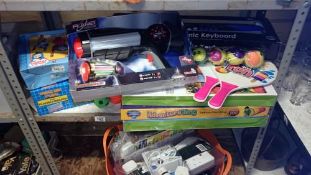 A quantity of toys including adventure tent & keyboard etc.