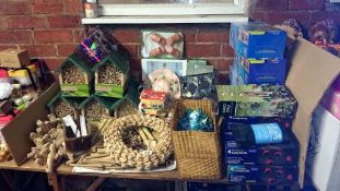 A large quantity of garden items including insect houses etc.