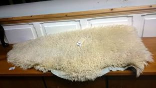 A sheep skin rug