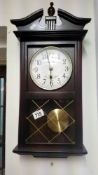 A modern constant quartz Westminster chime wall clock