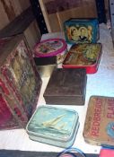 A quantity of old advertising tins