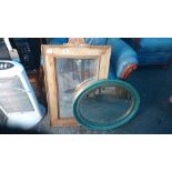 2 wooden framed mirrors