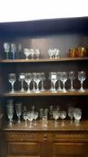 A large quantity of drinking glasses