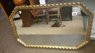 a gilt framed mirror