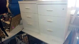 A pair of 3 drawer bedside chests