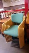 A set of 6 green upholstered office chairs