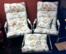 2 floral metal framed chairs with matching footstool