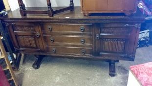 A 3 drawer 2 door sideboard