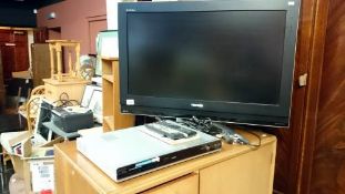 A Toshiba flat screen TV & a Philip's DVD recorder