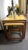 A teak retro nest of 3 tables