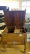 A mahogany sewing box with silver handle