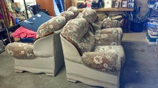 A 3 seater sofa & 2 armchairs