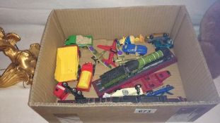 A quantity of miscellaneous toy cars & trains etc.
