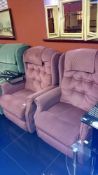 2 pink reclining armchairs