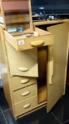 A small wardrobe with 3 drawers a mirror & cupboard