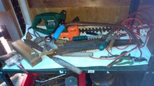 A quantity of tools including hedge trimmer & saws etc.