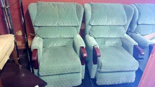 2 green reclining armchairs