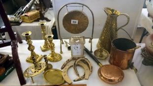 A quantity of brass ware including candlesticks & clock etc.