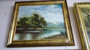 A gilt framed painting