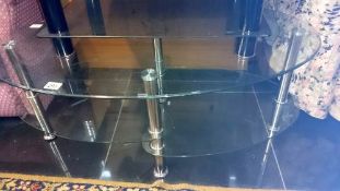 An oval glass coffee table