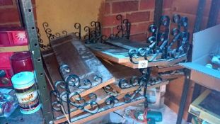 A quantity of shelves with wrought iron brackets