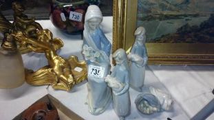 3 Lladro figurines and a Lladro duck group