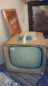 A vintage Murphy V350 TV with hand book