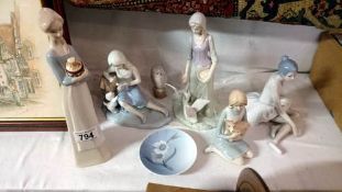 A quantity of Lladro style figures