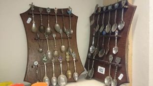 A quantity of souvenir spoons