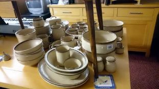 A large quantity of Denby tea and dinner ware