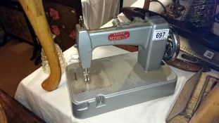 An Essex miniature sewing machine