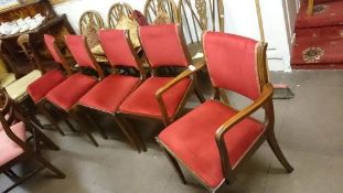 A set of 4 chairs and a matching carver chair