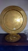 A large brass plaque and 3 others