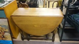 An oak drop leaf table