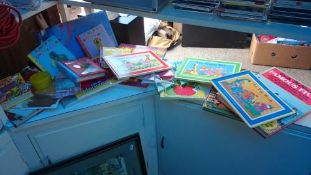 A quantity of children's books & craft items