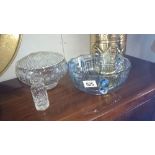 A cut glass rose bowl and a blue glass bowl