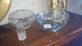 A cut glass rose bowl and a blue glass bowl