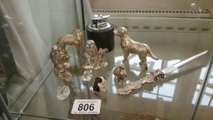 A mixed lot including white metal animals, paper knife etc