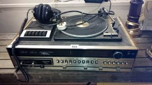 A record deck and headphones