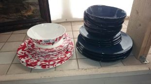 A quantity of new plates and bowls