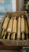 A box of wooden rolling pins