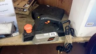 An electric sander and one other item